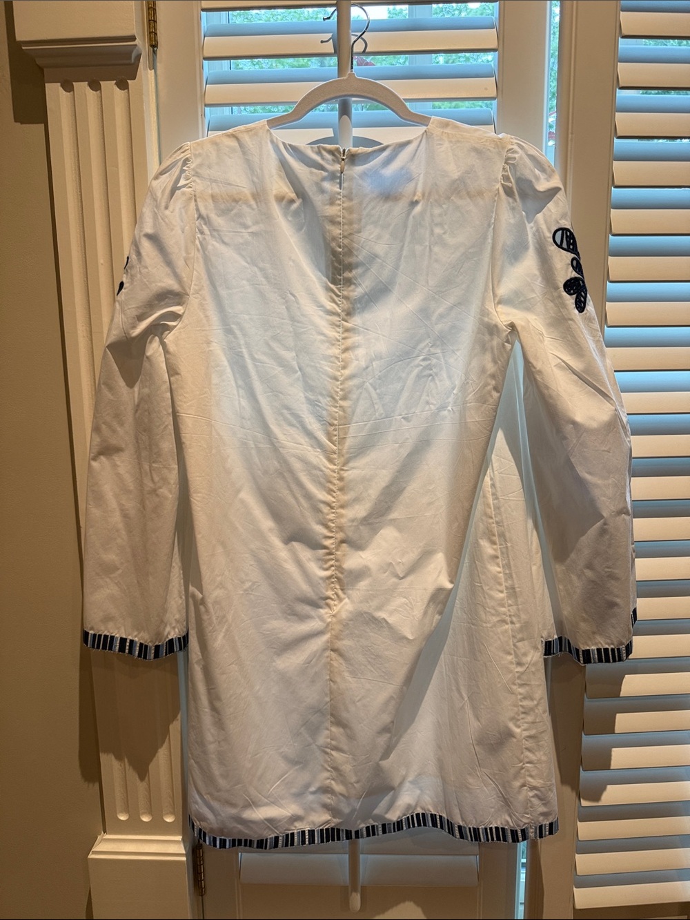 White Embroidered Mini Dress with Navy Floral Accents - Picture 2 of 4